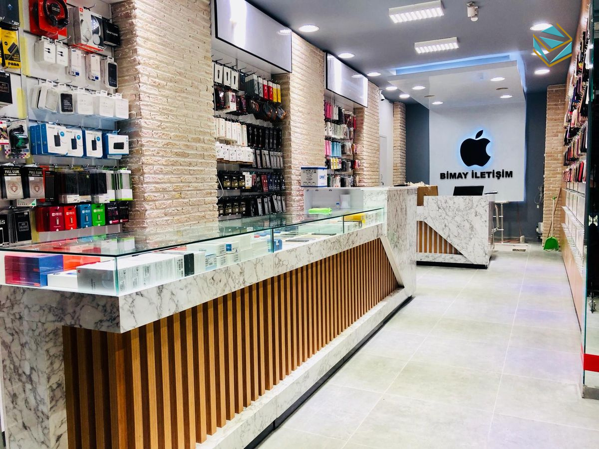 Hình ảnh minh họa một shop điện thoại phong cách hiện đại với ánh sáng LED trắng, kệ thấp và không gian mở giúp khách hàng trải nghiệm thoải mái.